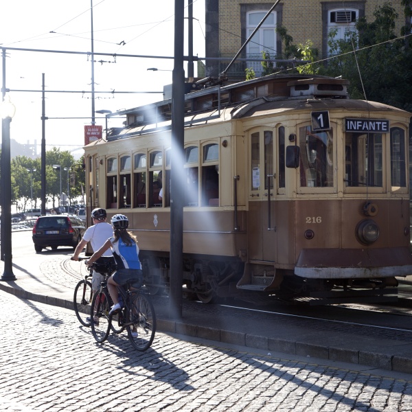 Cycling alongside Porto's historic tram